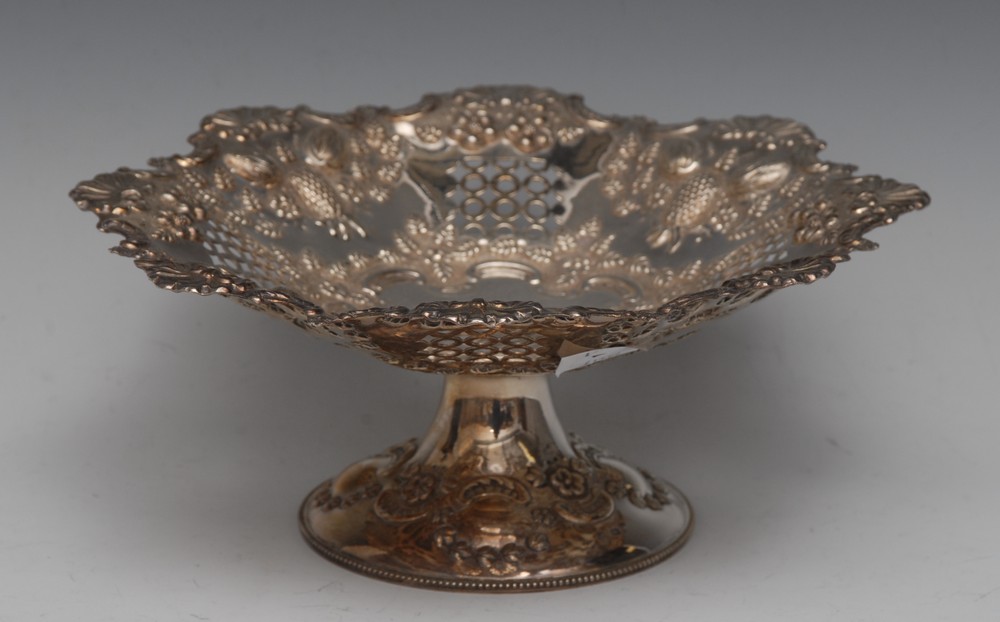 An Edwardian silver shaped circular pedestal dish,