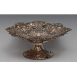 An Edwardian silver shaped circular pedestal dish,