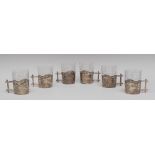 A set of six German Secessionist silver and glass tea glasses,