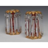 A pair of 19th century Staffordshire porcelain rococo lustres, in ruby and mustard,