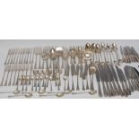 A Romanian Art Deco silver table service, comprising seven large table knives, nine medium knives,