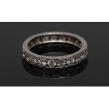 A diamond eternity ring, liner inset with twenty round brilliant cut diamonds,