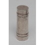 An 18th century silver cylindrical nutmeg grater, push-fitting cover enclosing a loose rasp,