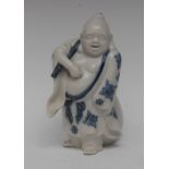 A Chinese porcelain figure, of Hotai, he stands, a bag on his back,