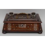 A post-Regency rosewood and mother-of-pearl marquetry pylon-shaped desk stand,
