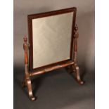 An early 20th century mahogany easel dressing-glass,
