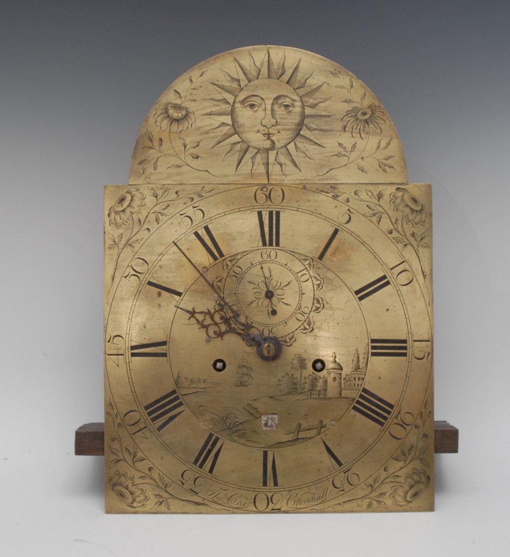 A George III longcase clock movement, 30cm arched brass dial inscribed Tho.