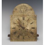 A George III longcase clock movement, 30cm arched brass dial inscribed Tho.