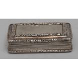 A William IV rounded rectangular snuff box, reeded sides, foliate scroll boards,