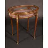 A 19th century French gilt-metal mounted mahogany bijouterie table, hinged cover,