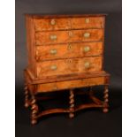 A William III/Queen Anne walnut chest on stand,