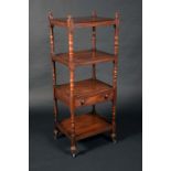 A George IV mahogany rectangular four-tier whatnot, turned finials and supports, drawer to apron,