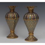 A pair of 19th century Kashmir enamel and gilt copper baluster vases,