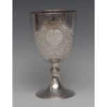 A 19th century Anglo-Indian silver ovoid pedestal goblet, engraved with birds,