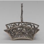 A Chinese silver arched rectangular swing handled sweetmeat basket,