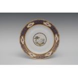A Derby shaped circular plate, painted by Billingsley and Boreman with a landscape,