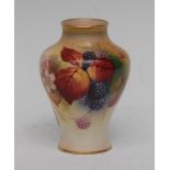 A Royal Worcester baluster shaped vase, painted by Kitty Blake, signed,