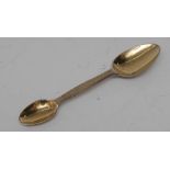 A Victorian silver-gilt medicine spoon, engine turned grip, 13cm long,