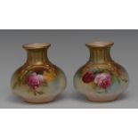 A pair of Royal Worcester lobed ovoid vases, painted with red and yellow cabbage roses,