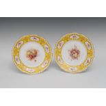 A pair of Royal Worcester shaped circular plates, painted by William Ricketts, signed,