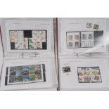 Two albums of mint stamps for 2006-2007 (volumes 24 & 25).