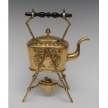 An Aesthetic Movement brass spirit kettle on stand and burner, turned ebonised handle,