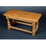Robert Thompson, Mouseman of Kilburn - an oak rounded rectangular coffee table, outswept top,