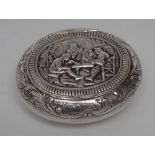 A Dutch silver oval snuff box, hinged cover chased with a tavern scene,