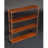 A set of Victorian mahogany four-tier wall shelves, brass suspension rings, bobbin-turned supports,