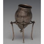 An Egyptian silver ovoid vase and stand, chased with figures and scenes from Antiquity,