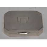 An Art Deco silver canted rectangular snuff box,