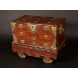 A 19th century Dutch Colonial brass-mounted hardwood chest-on-wheels,