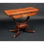 A Regency rosewood and brass marquetry rounded rectangular card table,