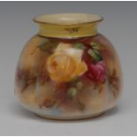 A Hadley Royal Worcester lobed ovoid vase, painted with red and yellow cabbage roses,