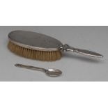 Georg Jensen - a silver clothes brush, stylised lotus socle, 22.