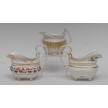 A Derby boat shaped cream jug, moulded in relief with flowers and foliage,