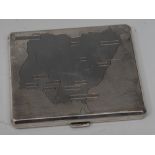 A George VI silver canted rectangular cigarette case, engraved with a map of Nigeria,