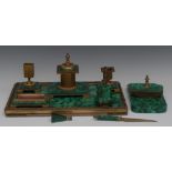 A composed malachite desk suite, comprising a combination tray and blotting pad, an inkwell,