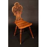 A harlequin set of four Continental walnut side chairs,