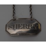 A George III silver curved canted rectangular wine label, Sherry,