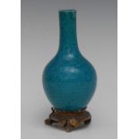 A 19th century ormolu mounted Chinese monochrome bottle vase, glazed in mottled tones of turquoise,