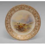A Royal Worcester circular plate, painted by Jas Stinton, signed,
