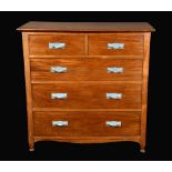 An Arts and Crafts walnut Fine Feathers chest of drawers, by Heal's,