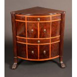 A 'George III' mahogany floor standing corner bedroom cabinet, moulded top above a rectangular door,