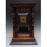An imposing Victorian Arts and Crafts oak, boxwood, parcel-gilt and ebonised bracket clock,