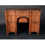 A 19th century mahogany shaped serpentine sideboard,