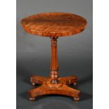 A George IV rosewood centre table, circular top, turned and fluted column,