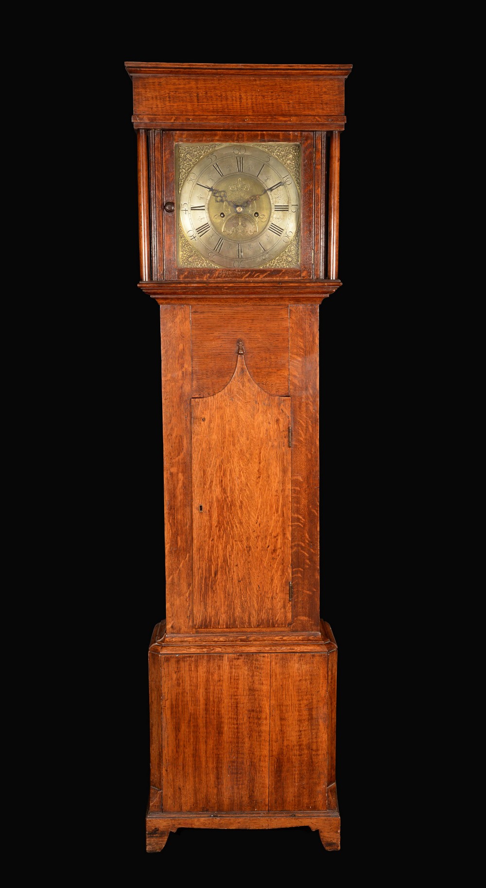 A George II long case clock, oak case, flat topped hood supported on plain turned columns, 12in (30.