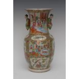 A 19th century Chinese Famille Verte baluster vase, painted with oriental figures and attendants,