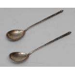 A pair of Russian silver picture back caviar spoons, spiral stems, 14.5cm long, St Petersburg c.